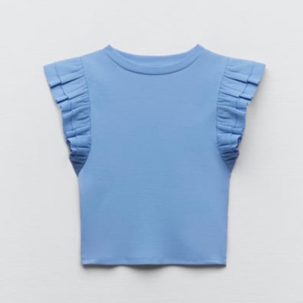 Light blue ruffle top